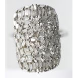 925 silver ring set with baguette diamonds, size P, 4.7g. P&P Group 1 (£14+VAT for the first lot and