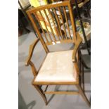 Edwardian inlaid mahogany bedroom elbow chair with more recently upholstered seat. Not available for