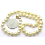 Pearl necklace with 14K gold clasp, each pearl 7 mm, necklace L: 45 cm. P&P Group 1 (£14+VAT for the