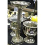 A large silver plated wine cooler on stand, together with a contemporary example, each H: 26 cm. Not