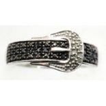 925 silver belt ring set with black and white diamonds, size O, 3.0g. P&P Group 1 (£14+VAT for the