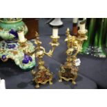 Two brass clock sconces, H: 33 cm. Not available for in-house P&P.