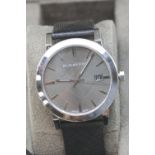 Boxed gents Burberry calendar wristwatch. P&P Group 1 (£14+VAT for the first lot and £1+VAT for