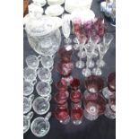 Glassware, to include a cut glass covered punch bowl with ladle and ten cups, two sets of etched