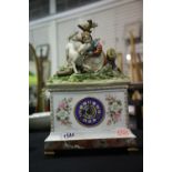 Large Capodimonte figural chiming ceramic clock with German two bell movement. Not available for