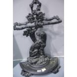 A reproduction black painted Coalbrookdale style cast iron umbrella stand, H: 68 cm. This lot is not