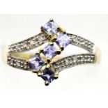 9ct gold, tanzanite and diamond ring, size S/T, 2.4g. P&P Group 1 (£14+VAT for the first lot and £