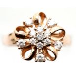 14ct rose gold flower ring set with white stones, size P, 4.1g. P&P Group 1 (£14+VAT for the first