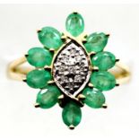 9ct gold, emerald and diamond flower ring, size N/O, 3.2g. P&P Group 1 (£14+VAT for the first lot