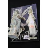 Two Lladro figurines; shepherd boy and Nativity shepherdess, with Lladro price guide, H: 21 cm. P&