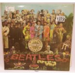 Early press Mono Beatles Sergeant Peppers album with poster. P&P Group 32(£18+VAT for the first