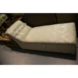A contemporary upholstered chaise longue with incorporated blanket box. Not available for in-house