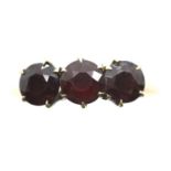 14ct gold ring set with three large garnets, size P, 3.1g. P&P Group 1 (£14+VAT for the first lot
