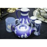 Three Wedgwood blue jasperware items including a water jug and two similar. P&P Group 3