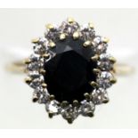 9ct gold sapphire and CZ set oval cluster ring, size O/P, 3.3g. P&P Group 1 (£14+VAT for the first
