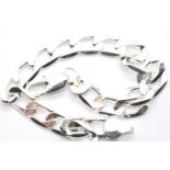 925 sterling silver flat curb chain bracelet, L: 20 cm, 11g. P&P Group 1 (£14+VAT for the first