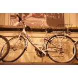 Ladies 18 speed Raleigh bike with rear basket. Not available for in-house P&P.