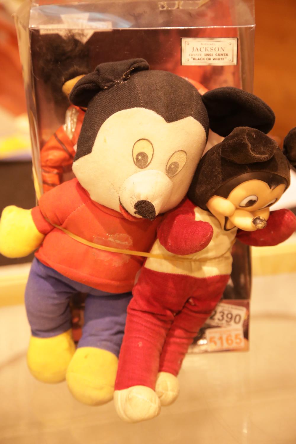 Two Mickey Mouse toys and a Michael Jackson singing doll. P&P Group 2 (£18+VAT for the first lot and