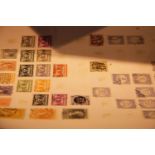 Four trays of GB and world stamps in albums (on covers) and loose including a silver jubilee