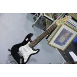 Power Play Stratocaster style electric guitar in black. Not available for in-house P&P. Condition