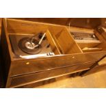 Vintage Grundig radiogram on tapered legs. Not available for in-house P&P.