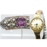 Gold plated Rotary wristwatch and an amethyst set clip. P&P group 1 (£14 + VAT for the first lot and