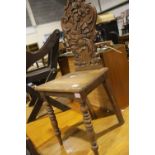 19th century Spanish carved oak hall chair. Not available for in-house P&P.