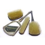 Hallmarked silver backed three piece dressing table set and similar brush. P&P Group 2 (£18+VAT