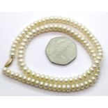 Flat pearl choker with a 14K gold clasp. Pearls 5: mm, L: 45 cm. P&P Group 1 (£14+VAT for the