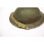 British WWII type D Day helmet with side Royal Artillery decal. P&P Group 3 (£25+VAT for the first