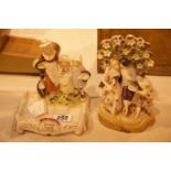 Two ceramic family figurines. Not available for in-house P&P.