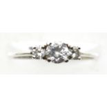 Silver three stone cubic zirconia dress ring. P&P Group 1 (£14+VAT for the first lot and £1+VAT