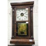 Seth Thomas wall mounted clock with decorative glass panel to the front. Not available for in-