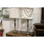 Substantial pair of brass lamps with original shade frames, H: 90 cm. Not available for in-house P&P