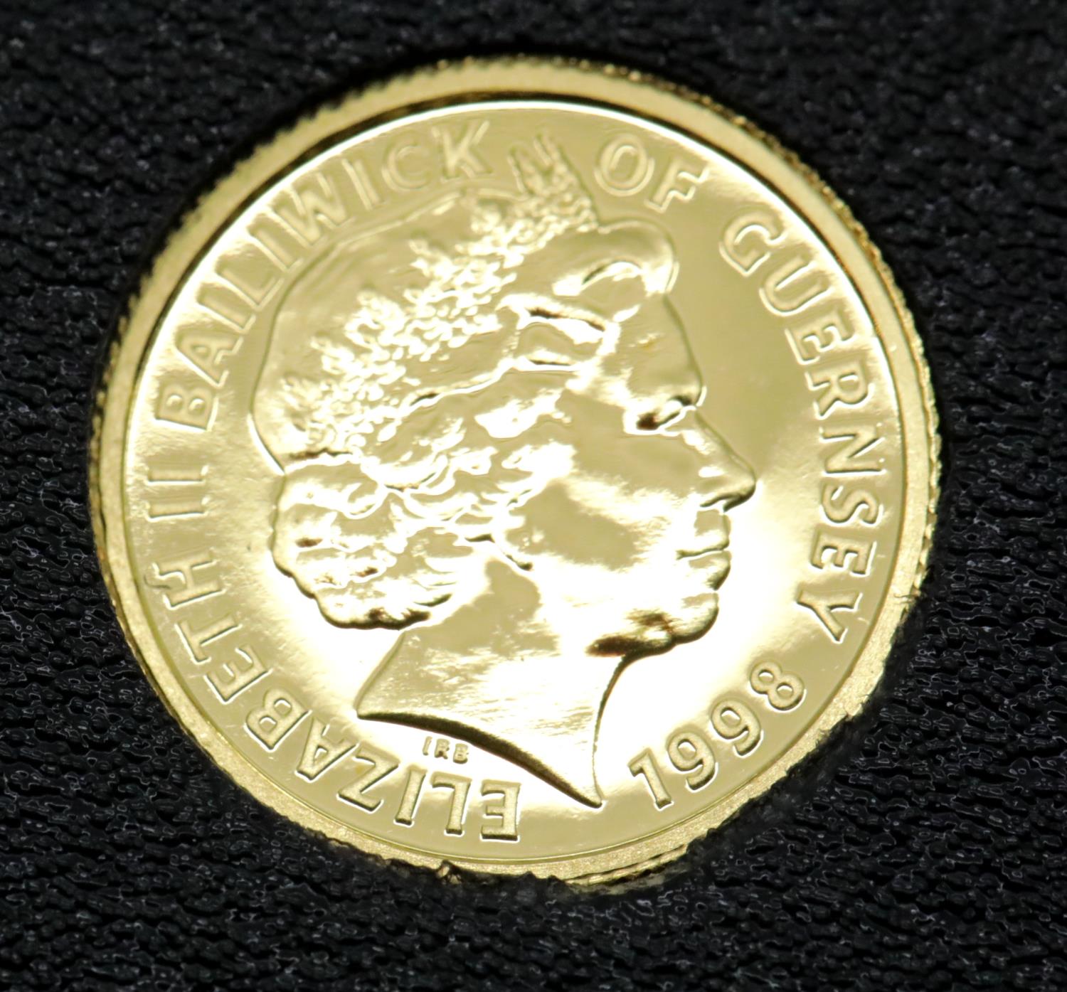 Guernsey £5 1998 coin, 1/25. P&P Group 1 (£14+VAT for the first lot and £1+VAT for subsequent lots)