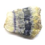 Piece of polished blue john, 4 x 3 cm, 22g. P&P Group 1 (£14+VAT for the first lot and £1+VAT for