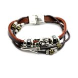 Gents leather cord bracelet with white metal dragon. P&P Group 1 (£14+VAT for the first lot and £1+