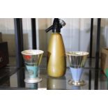 Vintage soda syphon and two cooks measuring cups. P&P Group 2 (£18+VAT for the first lot and £3+