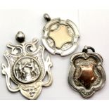 Three hallmarked silver fobs, two with gold shield to centre, total weight 31g. P&P Group 1 (£14+VAT
