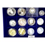 Collection of mixed coins and medallions including silver example. P&P Group 1 (£14+VAT for the