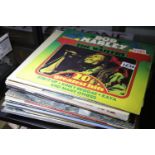 Approximately 30 mixed LPs including Yes and Bob Marley. P&P Group 3 (£25+VAT for the first lot