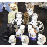 Selection of Staffordshire style cat and dog figurines, including a pair of Staffordshire