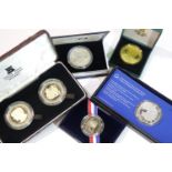 Collection of boxed commemorative coins including Pobjoy. P&P Group 1 (£14+VAT for the first lot and