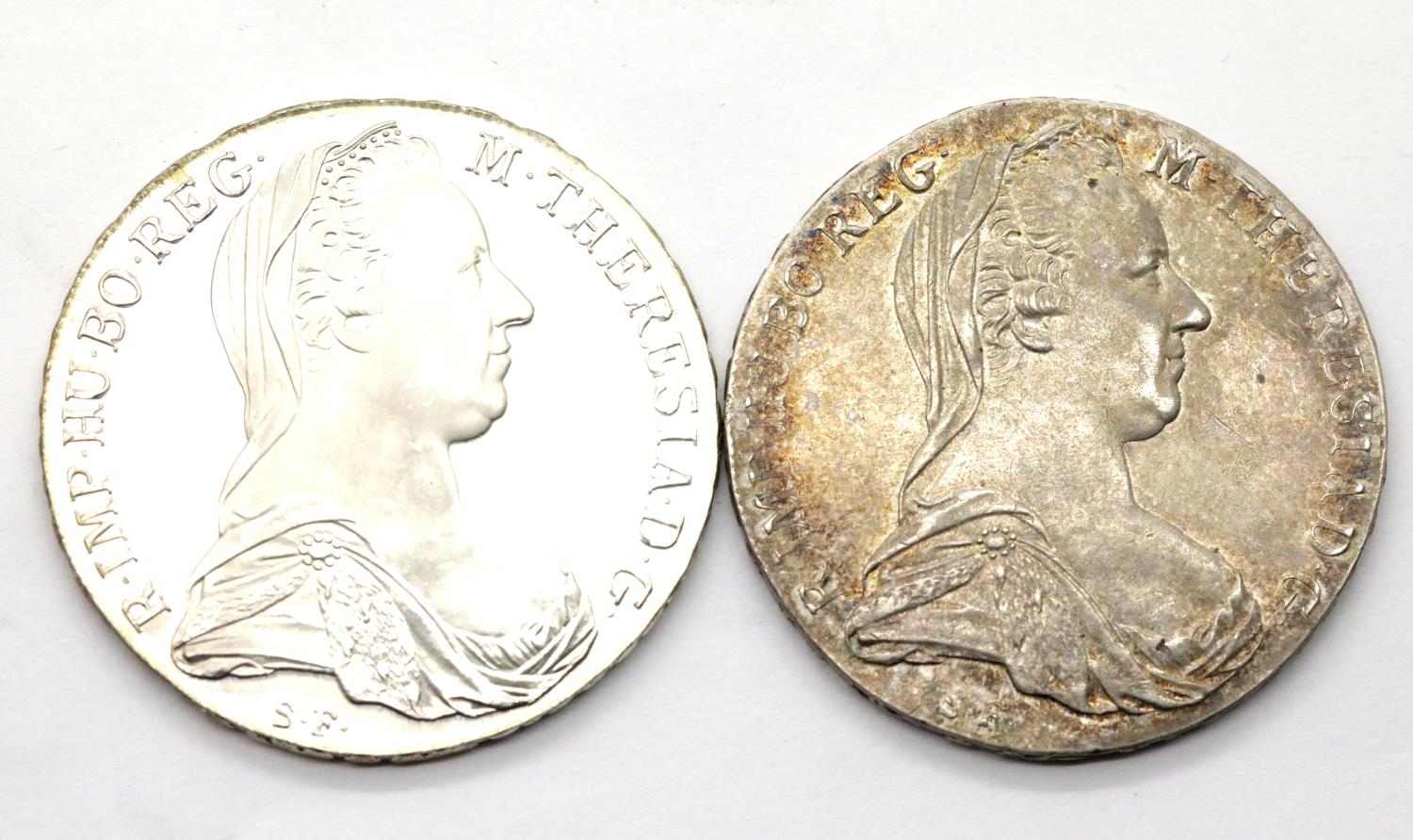 Two silver Maria Theresa coins. P&P Group 1 (£14+VAT for the first lot and £1+VAT for subsequent