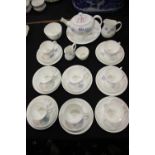 Wedgwood Ice Rose design tea service, an eight place setting comprising cups, saucers and side