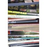 Shelf of motor racing related books. Not available for in-house P&P