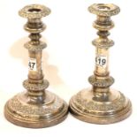Pair of silver plated heavy candlesticks with stylised decoration, H: 21 cm. P&P Group 1 (£14+VAT