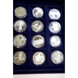 Twelve World at War Commemorative coins. P&P Group 1 (£14+VAT for the first lot and £1+VAT for