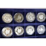 Eight Commemorative coins including silver proof. P&P Group 1 (£14+VAT for the first lot and £1+