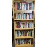 Large bookcase containing mixed books, history and historical fiction, hardback and paperback. Not
